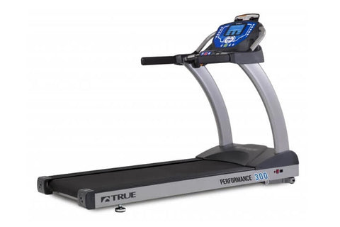 TRUE Performance 300 treadmill with blue digital display console, black running belt, and silver frame on white background