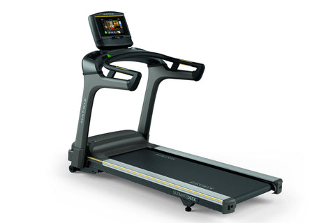 Matrix T75 treadmill with black belt and gray frame, featuring touchscreen display and dual handles on white background