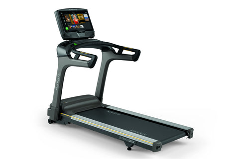 Matrix T75 treadmill with black belt and gray frame, featuring touchscreen display and dual handles on white background
