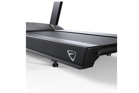 Black and gray Vision T600 light commercial treadmill with digital display console, dual handles, and textured running deck o