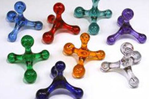 Set of seven colorful translucent fidget spinners in blue, red, teal, purple, green, orange, and silver on white background