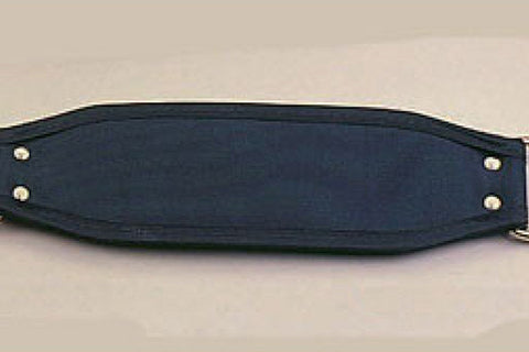 Navy nylon strap with silver metal studs and adjustable buckle hardware, flat lay on tan background