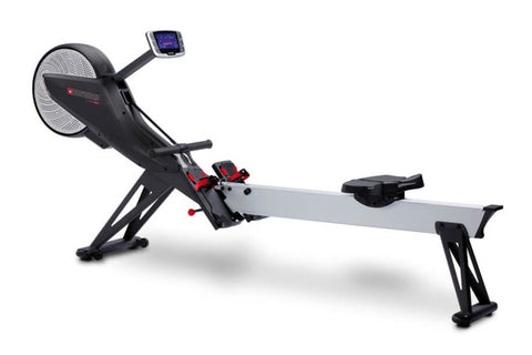 Black and silver rowing machine with digital display, foam grip handles, and adjustable resistance wheel on white background
