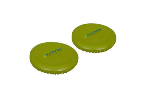 Pair of lime green Rejuvenation stability and balance mini discs with textured undersides on white background
