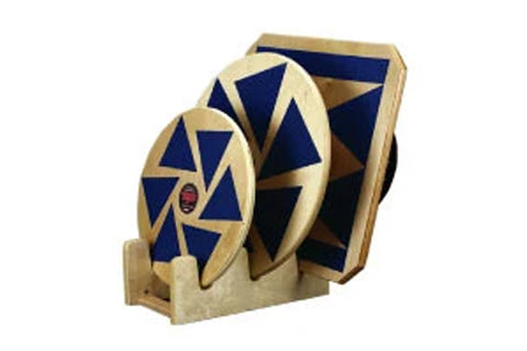 Warrior Wobble and Rocker Boards with geometric navy and cream design on natural wood, flat lay