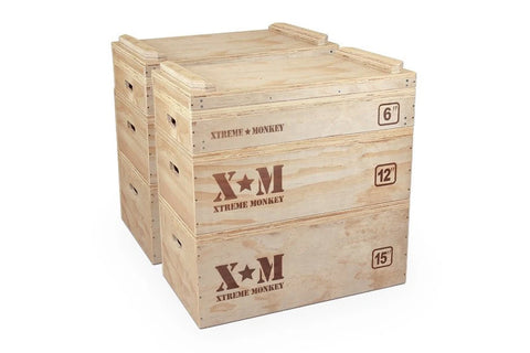 Plyometric wooden jerk blocks set with three stacked boxes labeled 6", 12", and 15" in natural pine with red Xtreme Monkey br