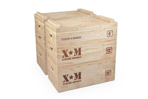 Wooden plyometric box with Xtreme Monkey branding, multiple heights marked 6", 12", and 15", on white background