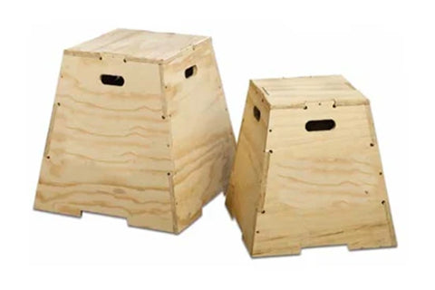 Two natural wood plyo boxes with handle cutouts, larger box on left and smaller on right, shown on white background