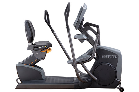 Octane XR6000 recumbent exercise bike with black frame, padded seat and backrest, dual handle bars, and foot pedals on white 