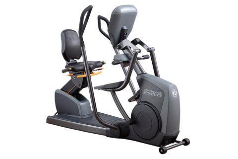 Octane XR6000 recumbent exercise bike with black frame, padded seat and backrest, dual handle bars, and foot pedals on white 