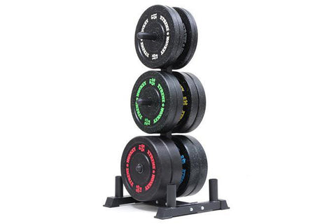 Three stacked black bumper plates with colored text markings on vertical storage rack, white background
