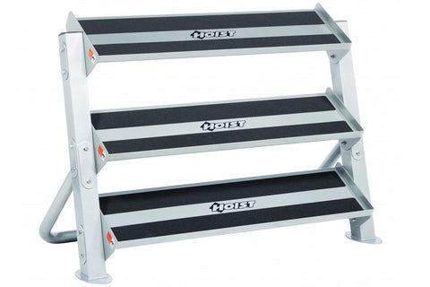 Silver and black three-tier weight plate storage rack with textured black grip surfaces and Hoist branding on white backgroun