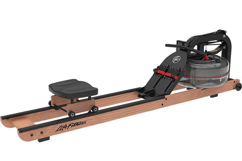Life Fitness water rowing machine with wood base, black metal frame, padded seat, and transparent water tank on white backgro