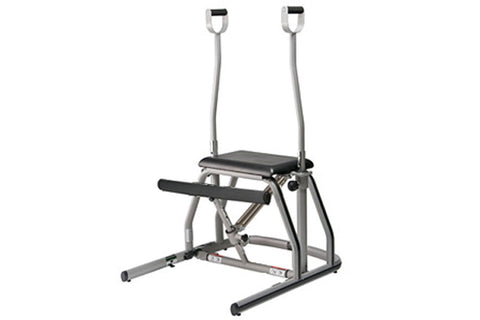 Peak Pilates MVe single pedal chair with gray metal frame, black padded seat and handles, displayed on white background