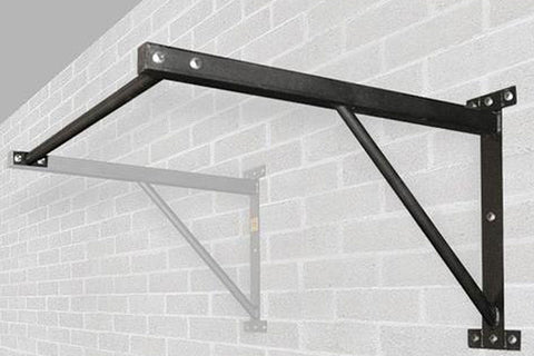 Black steel wall-mounted chin up bar with diagonal support braces and mounting brackets, installed on brick wall