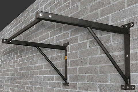 Black steel wall-mounted chin-up bar with diagonal braces, mounted on brick wall