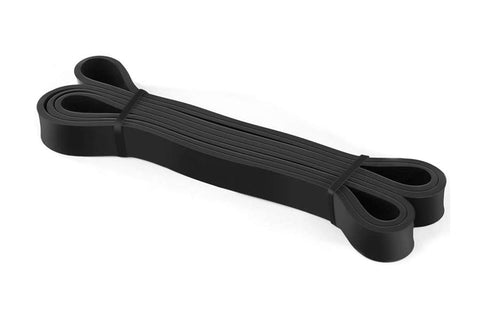 Black resistance loop band with ribbed texture and looped handles on each end, displayed on white background